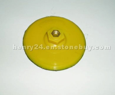 Plastic holder for polishing pads