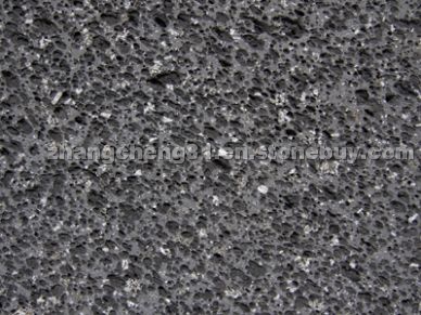 Charcoal black vacuolar basalt