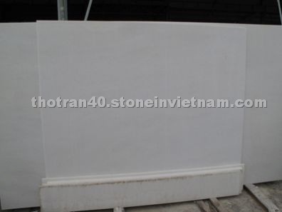 white marble slabs and tiles