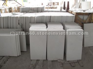 white marble slabs and tiles