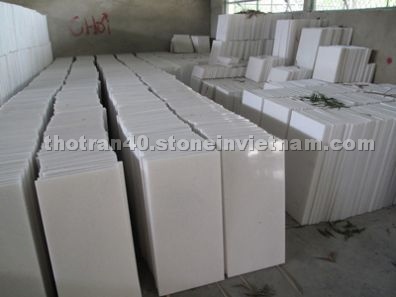 white marble slabs and tiles