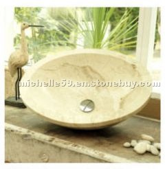 Oval travertine raised bowl