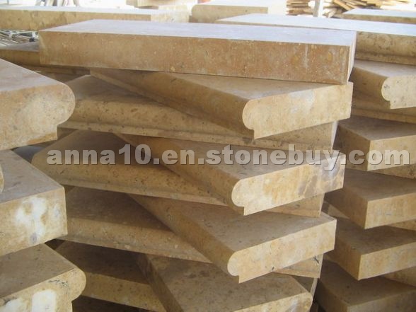 Yellow limestone swimming pool border