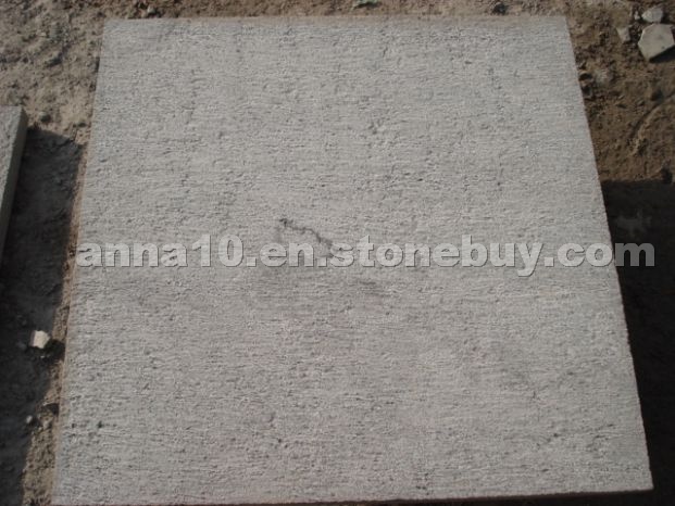 Blue limestone chiselled tile