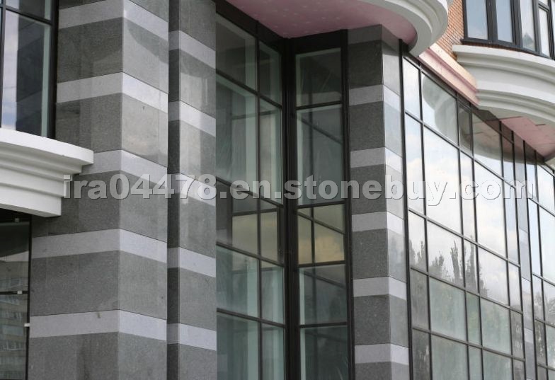 Main fasade sealing light grey granit.