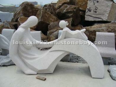 Person Carving Sculpture