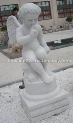 Person Carving Sculpture