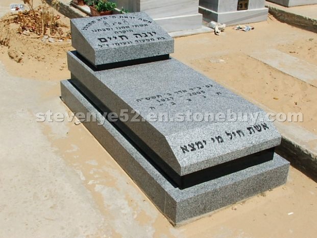 Light grey granite tombstone
