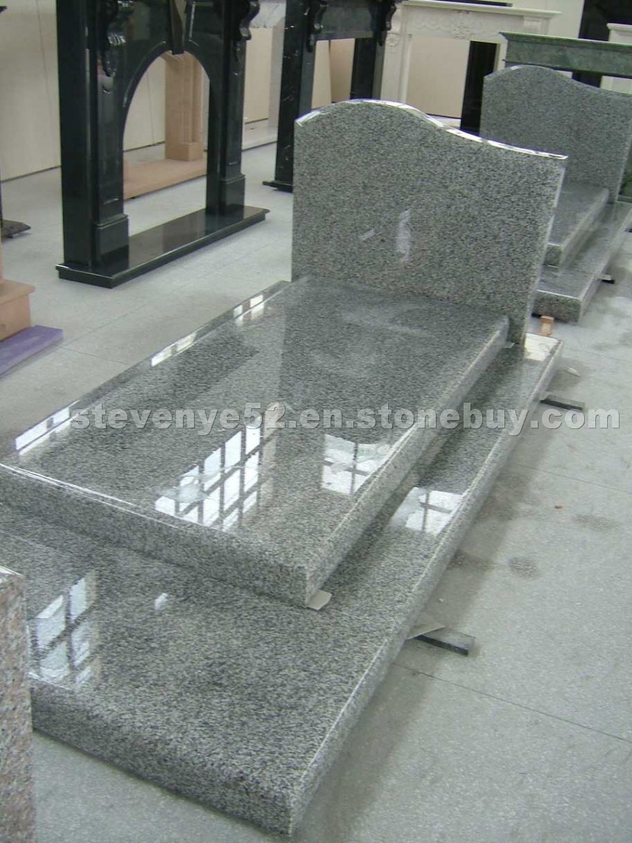 Light grey granite tombstones