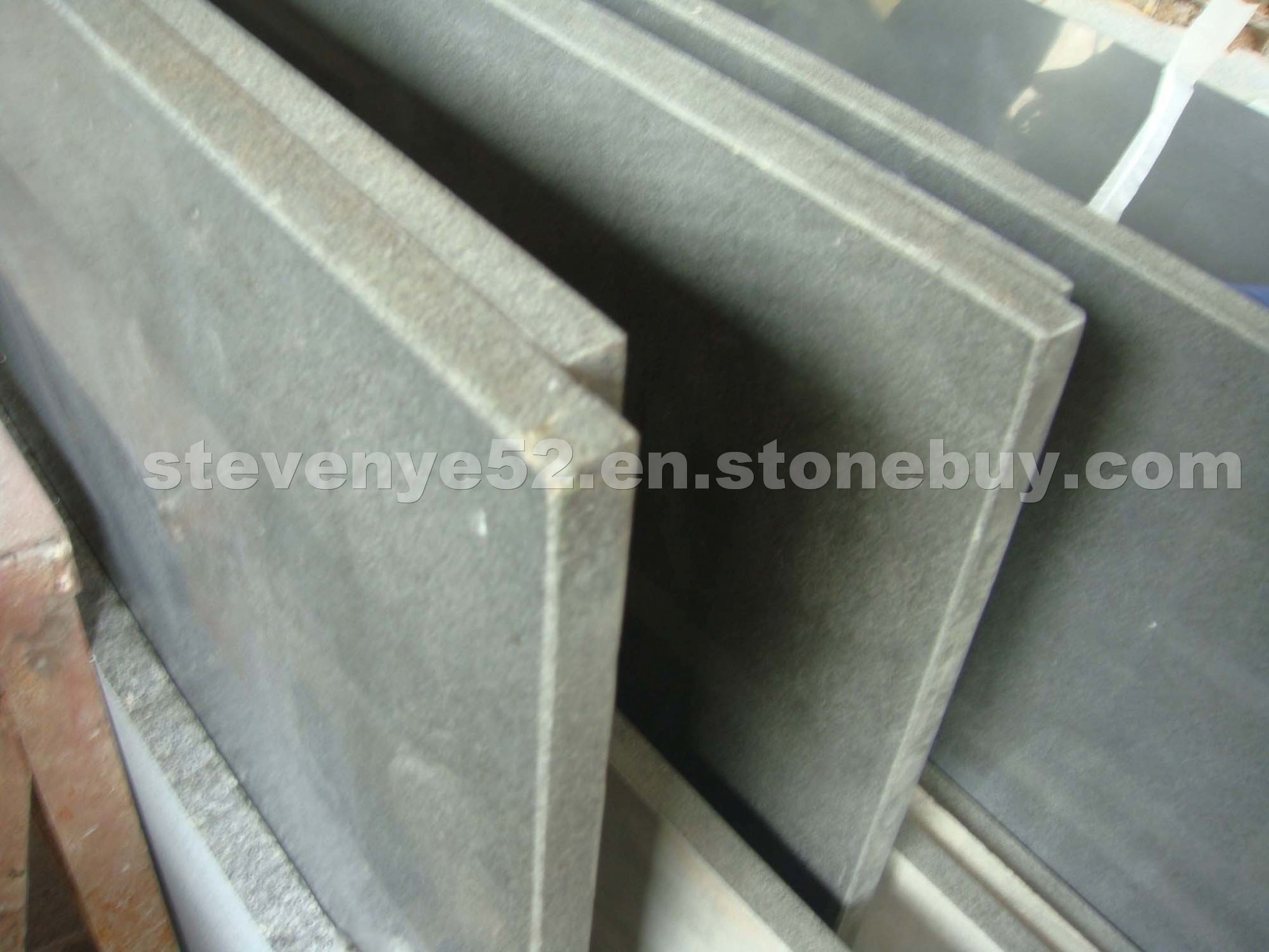 Blue stone tiles honed