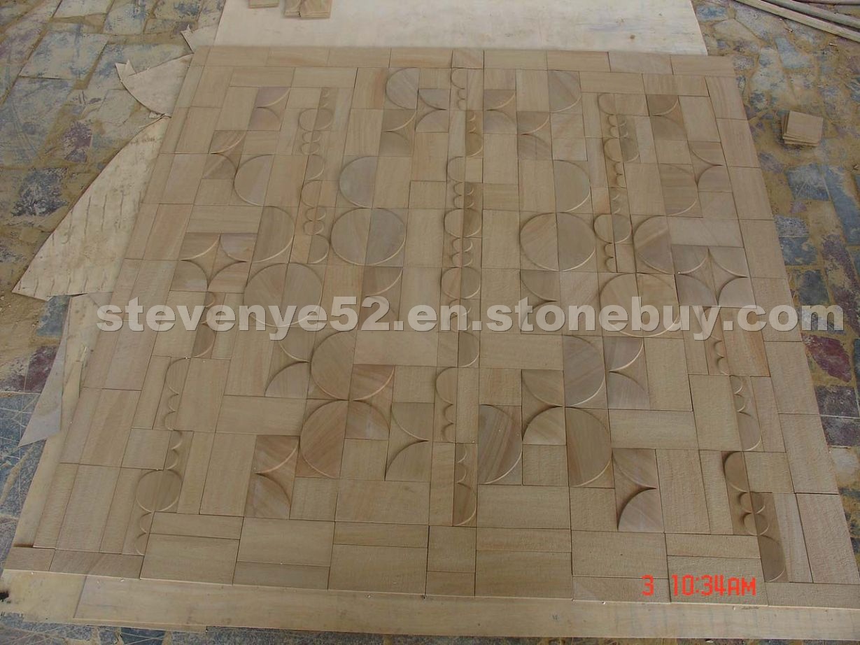 Yellow sandstone wall sculpture