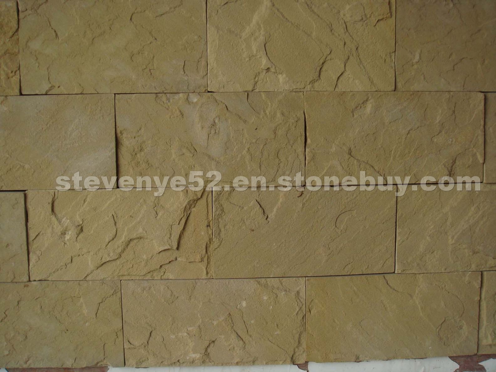Beige sandstone wall