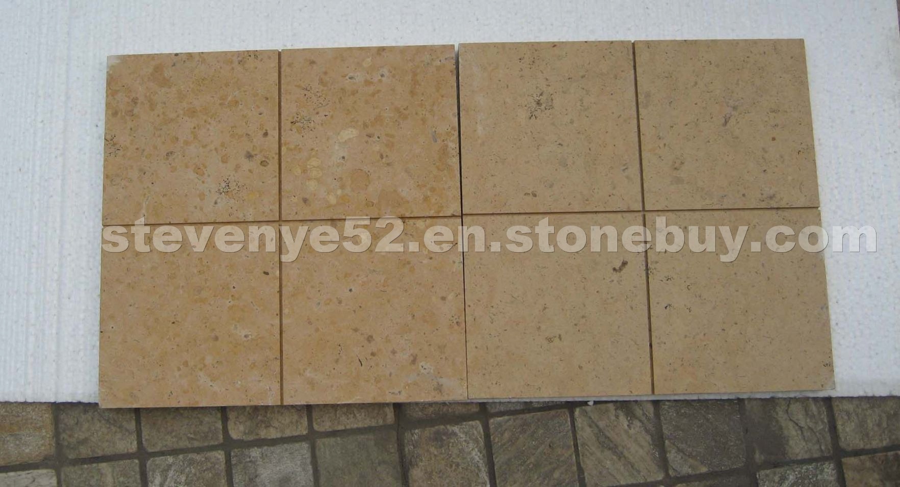 Beige limestone tiles acid