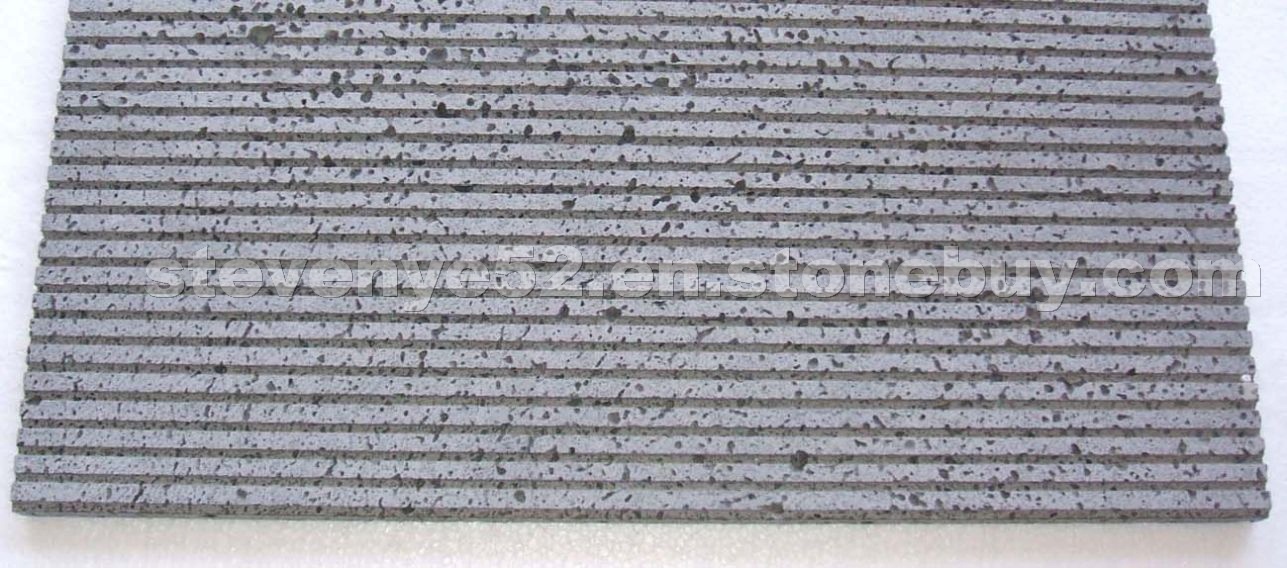 Grey travertine grooved