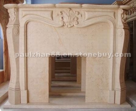 Beige carved fireplace Beige carved fireplace
