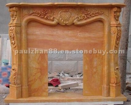 Gold marble carved fireplace