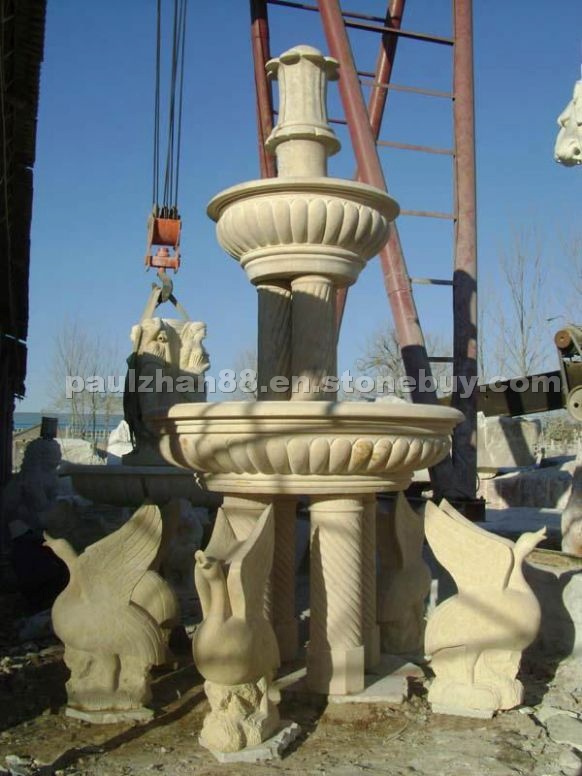 carved yellow limestone fountain carved yellow limestone fountain