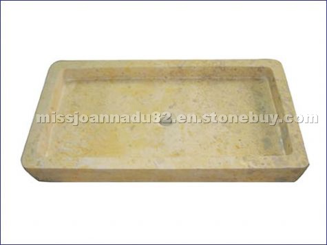 Yellow limestone shower base