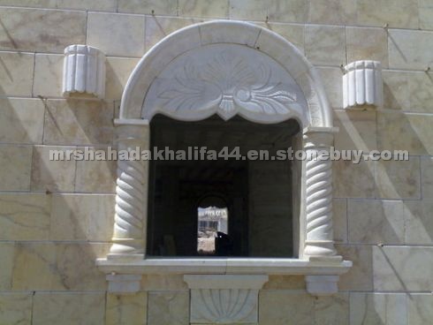 Carved stone windows surround