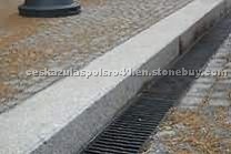 Kerbs , bush hammered