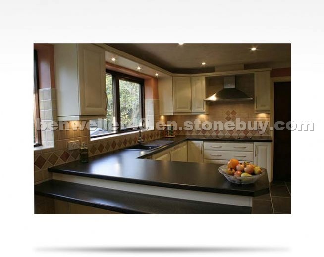 Traditional worktop and tiling splashback
