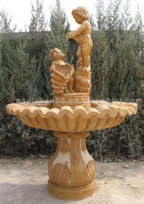 Statued yellow limestone water fountain Statued yellow limestone water fountain