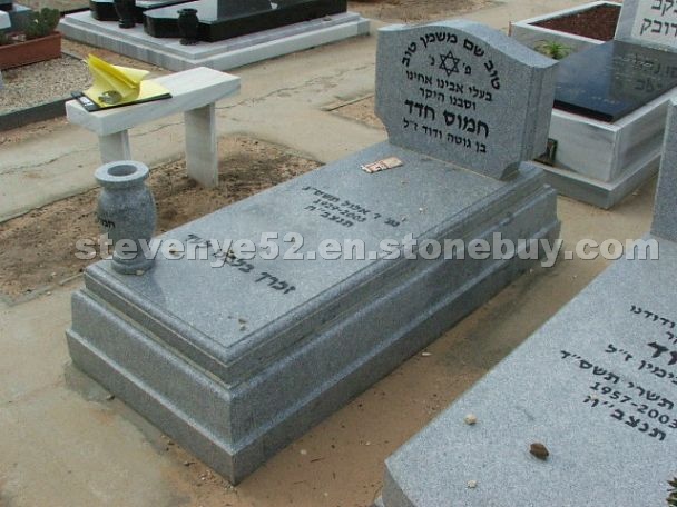 Grey granite tombstone
