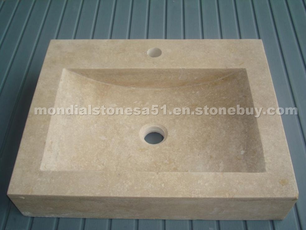 Wash-hand basin posed out of travertine