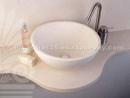 Bowl in Bianco Neve limestone