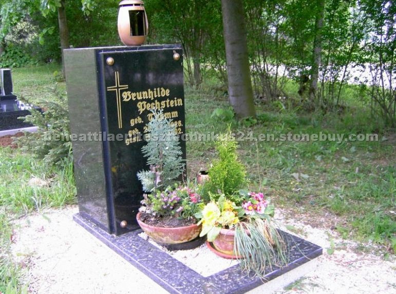 Granite grave markers, urns, marble statues