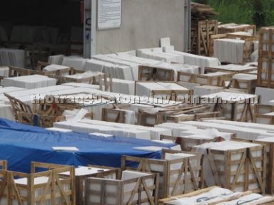 white marble slabs and tiles