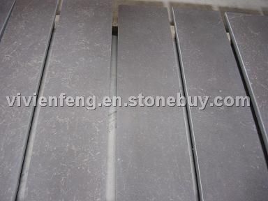 brown limestone tiles