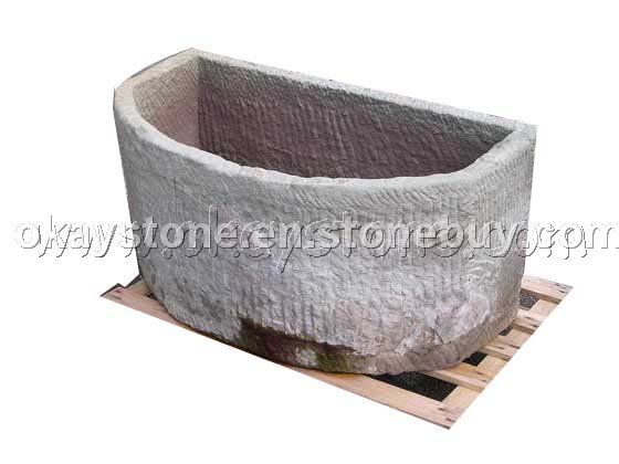 antique D-shape stone trough