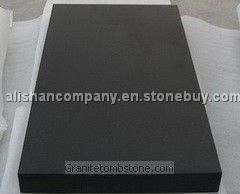 Black granite tiles and slabs