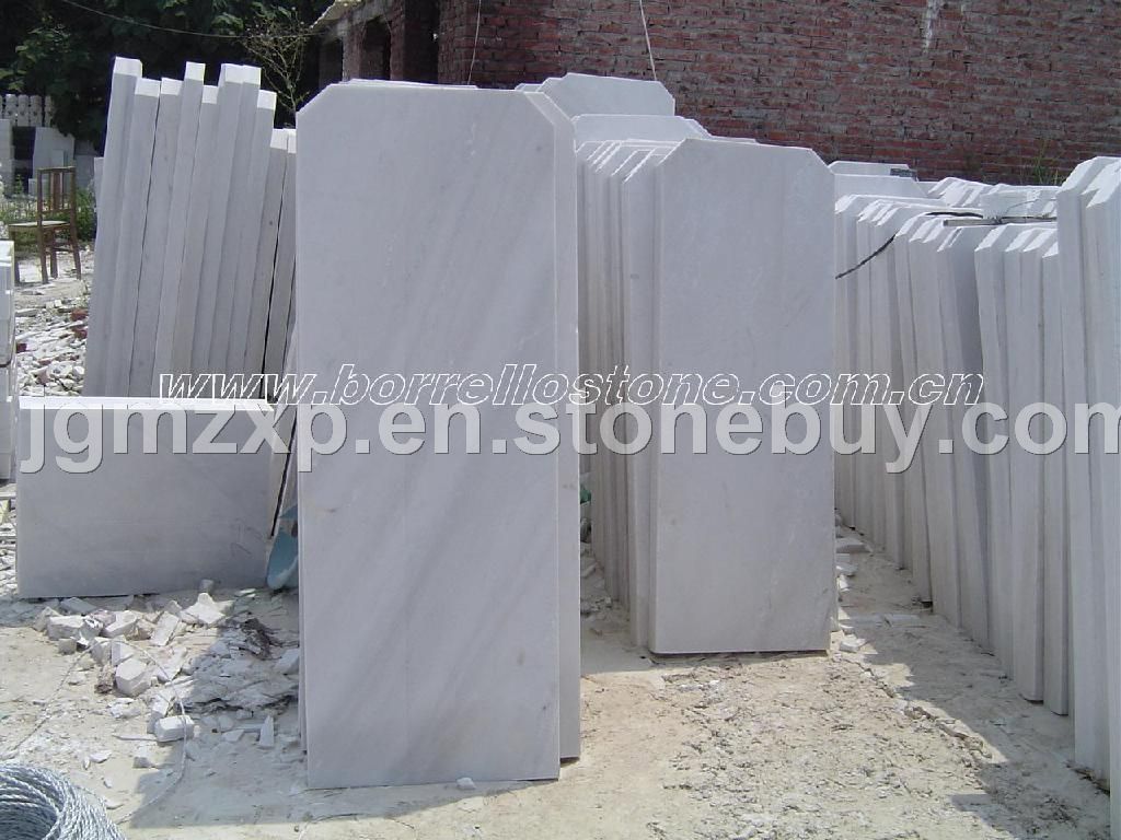 snow white marble tombstone and gravestone
