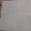 Yellow limestone sandblasted tile