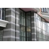 Main fasade sealing light grey granit.
