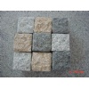 Gray,dark granite cubic paving stone