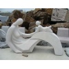 Person Carving Sculpture