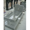 Light grey granite tombstones