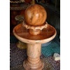 Yellow marble fountain ball