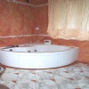 Bathroom in Marble Rosso Alambra and Calacatta Ven