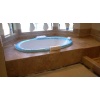 Noche Travertine tub surrround