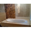 Travertine and marble bathtub surround