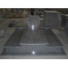 Grey granite tombstone