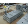 Grey granite tombstone