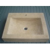 Wash-hand basin posed out of travertine