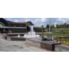 Fountain with a flower garden