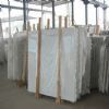 bundles of white marble slabs