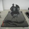Cross style monument with covering